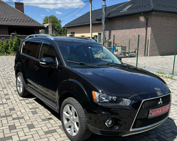 Чорний Міцубісі Аутлендер, об'ємом двигуна 2.2 л та пробігом 214 тис. км за 10600 $, фото 4 на Automoto.ua