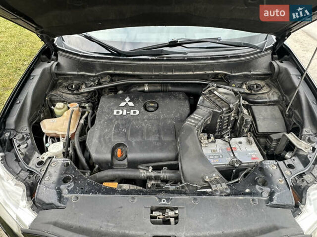 Черный Мицубиси Аутлендер, объемом двигателя 1.97 л и пробегом 224 тыс. км за 9000 $, фото 18 на Automoto.ua