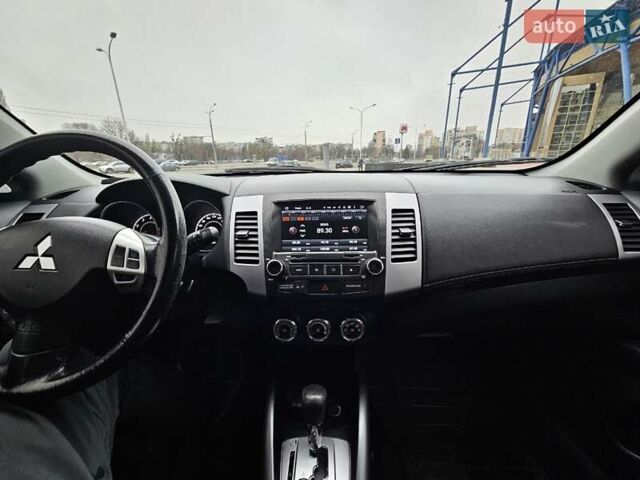 Чорний Міцубісі Аутлендер, об'ємом двигуна 2.4 л та пробігом 70 тис. км за 13000 $, фото 20 на Automoto.ua