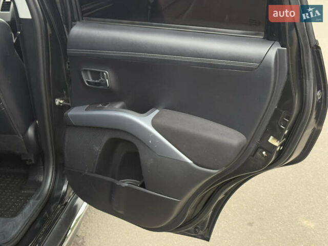 Чорний Міцубісі Аутлендер, об'ємом двигуна 1.97 л та пробігом 276 тис. км за 9200 $, фото 24 на Automoto.ua