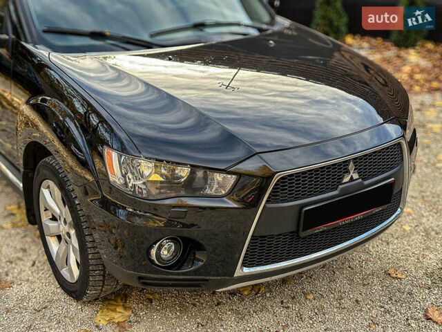 Черный Мицубиси Аутлендер, объемом двигателя 2.2 л и пробегом 226 тыс. км за 11500 $, фото 26 на Automoto.ua