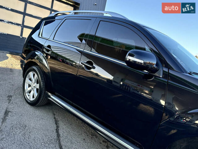 Черный Мицубиси Аутлендер, объемом двигателя 2.2 л и пробегом 263 тыс. км за 11300 $, фото 7 на Automoto.ua