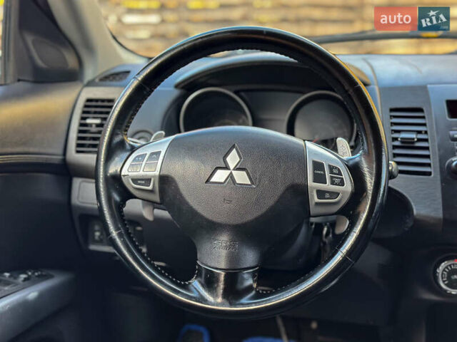 Черный Мицубиси Аутлендер, объемом двигателя 2.2 л и пробегом 226 тыс. км за 11500 $, фото 84 на Automoto.ua