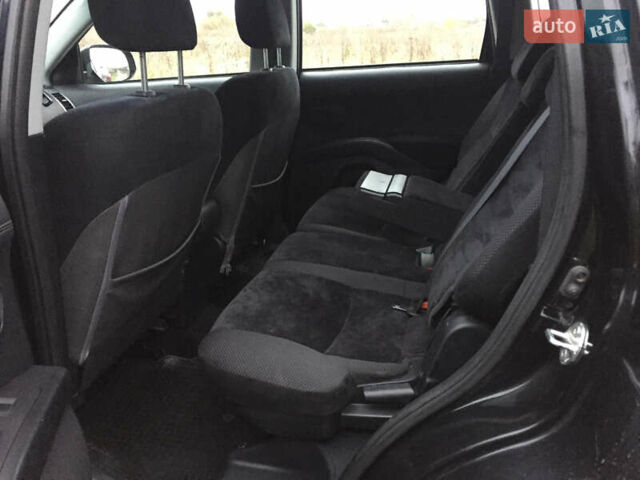 Черный Мицубиси Аутлендер, объемом двигателя 2.36 л и пробегом 315 тыс. км за 9700 $, фото 14 на Automoto.ua