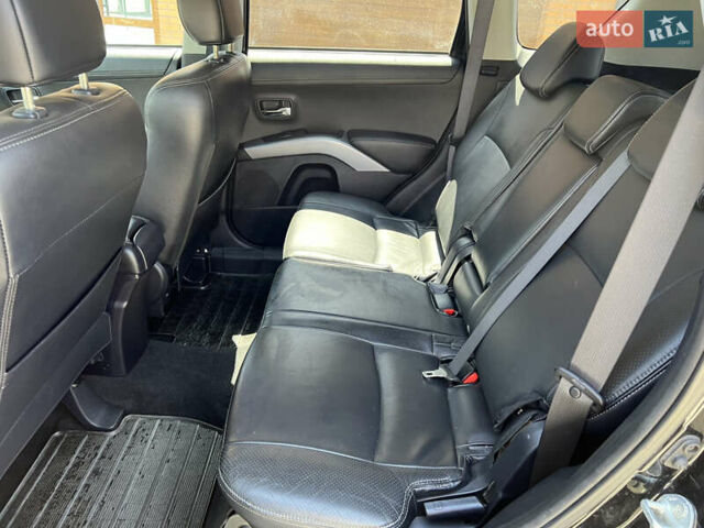 Чорний Міцубісі Аутлендер, об'ємом двигуна 2.2 л та пробігом 214 тис. км за 10600 $, фото 21 на Automoto.ua