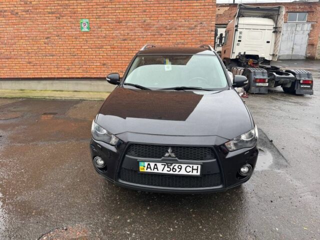 Черный Мицубиси Аутлендер, объемом двигателя 2.4 л и пробегом 305 тыс. км за 10000 $, фото 4 на Automoto.ua