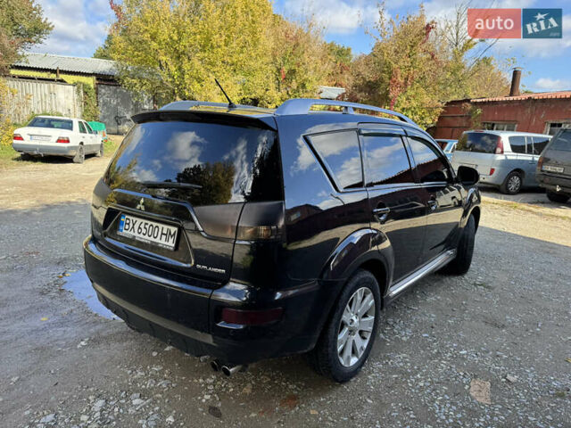 Чорний Міцубісі Аутлендер, об'ємом двигуна 2 л та пробігом 258 тис. км за 8699 $, фото 5 на Automoto.ua