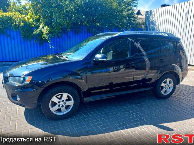 Чорний Міцубісі Аутлендер, об'ємом двигуна 2 л та пробігом 291 тис. км за 11200 $, фото 7 на Automoto.ua