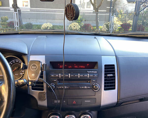 Черный Мицубиси Аутлендер, объемом двигателя 1.97 л и пробегом 292 тыс. км за 10900 $, фото 31 на Automoto.ua