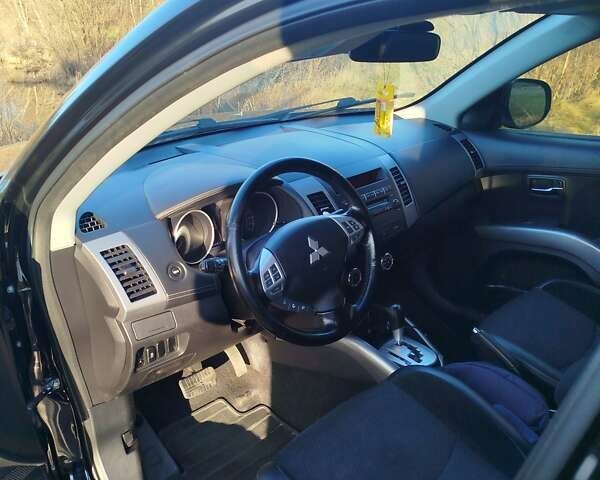 Черный Мицубиси Аутлендер, объемом двигателя 2 л и пробегом 261 тыс. км за 9700 $, фото 20 на Automoto.ua