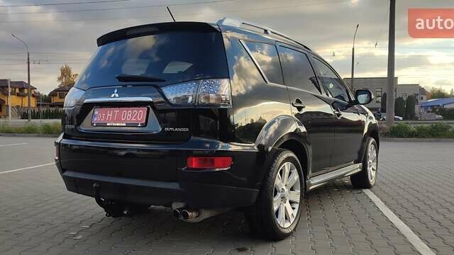 Черный Мицубиси Аутлендер, объемом двигателя 2 л и пробегом 210 тыс. км за 10600 $, фото 6 на Automoto.ua