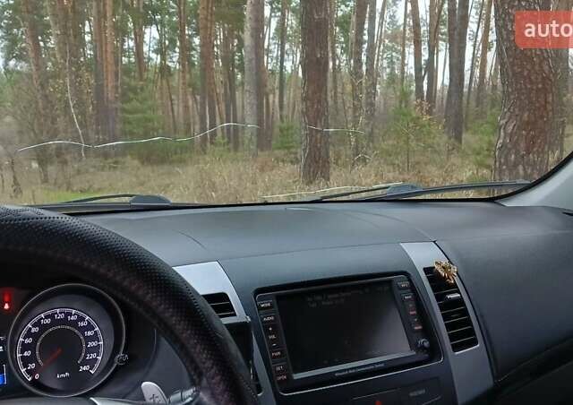 Черный Мицубиси Аутлендер, объемом двигателя 2.2 л и пробегом 267 тыс. км за 9999 $, фото 6 на Automoto.ua