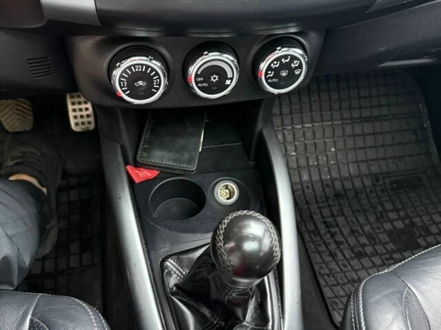 Чорний Міцубісі Аутлендер, об'ємом двигуна 2 л та пробігом 210 тис. км за 10700 $, фото 6 на Automoto.ua