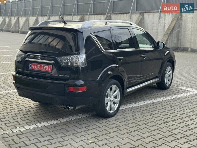 Черный Мицубиси Аутлендер, объемом двигателя 2.2 л и пробегом 225 тыс. км за 10950 $, фото 17 на Automoto.ua