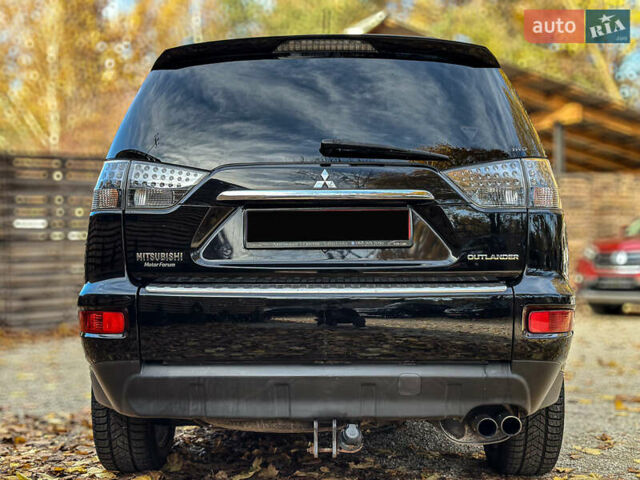 Черный Мицубиси Аутлендер, объемом двигателя 2.2 л и пробегом 226 тыс. км за 11500 $, фото 36 на Automoto.ua