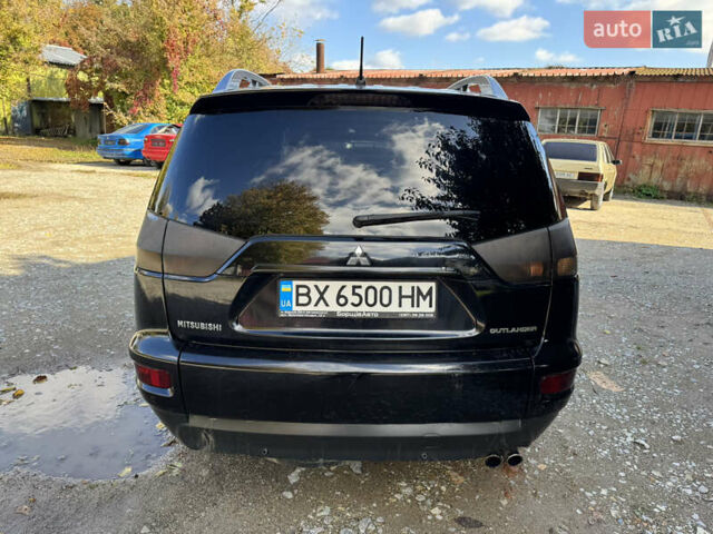 Чорний Міцубісі Аутлендер, об'ємом двигуна 2 л та пробігом 258 тис. км за 8699 $, фото 6 на Automoto.ua