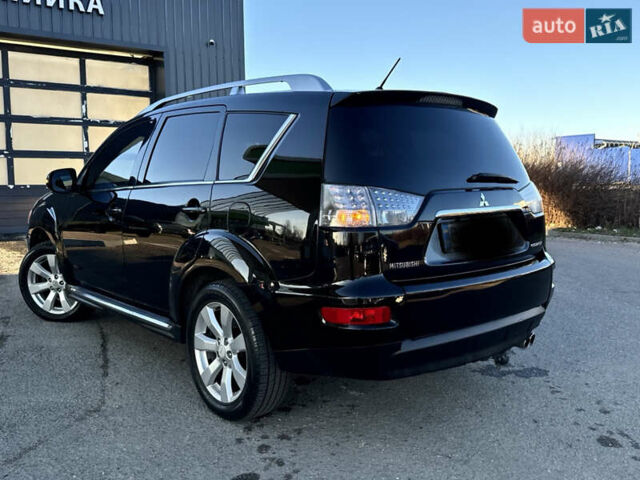 Черный Мицубиси Аутлендер, объемом двигателя 2.2 л и пробегом 263 тыс. км за 11300 $, фото 10 на Automoto.ua