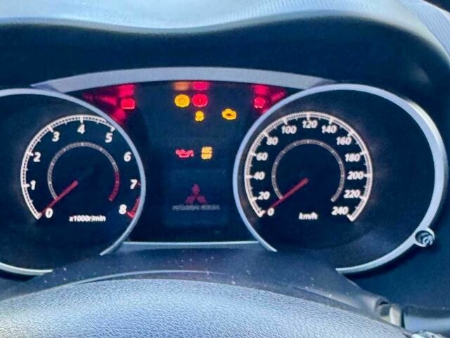 Чорний Міцубісі Аутлендер, об'ємом двигуна 2 л та пробігом 225 тис. км за 9900 $, фото 16 на Automoto.ua