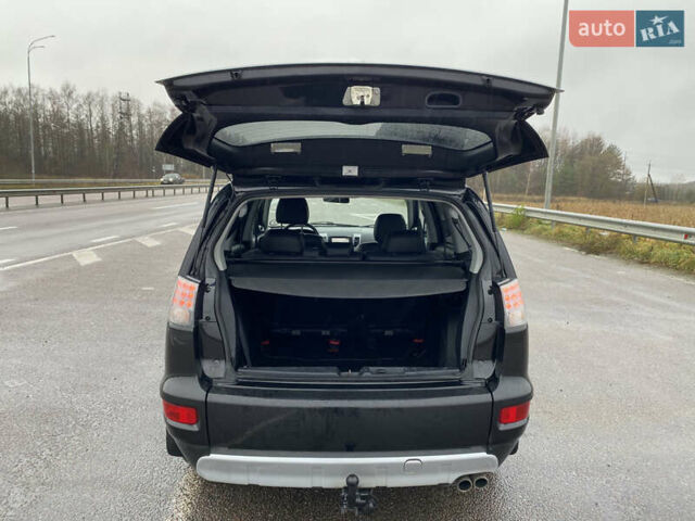 Черный Мицубиси Аутлендер, объемом двигателя 2.2 л и пробегом 227 тыс. км за 10700 $, фото 40 на Automoto.ua