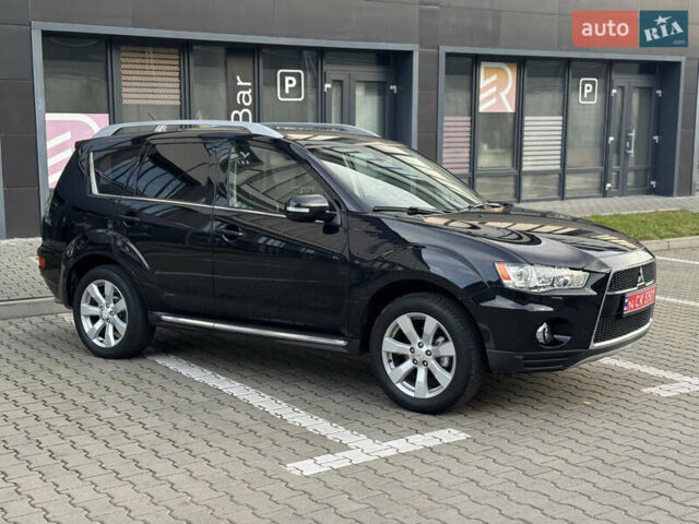 Черный Мицубиси Аутлендер, объемом двигателя 2.2 л и пробегом 225 тыс. км за 10950 $, фото 11 на Automoto.ua