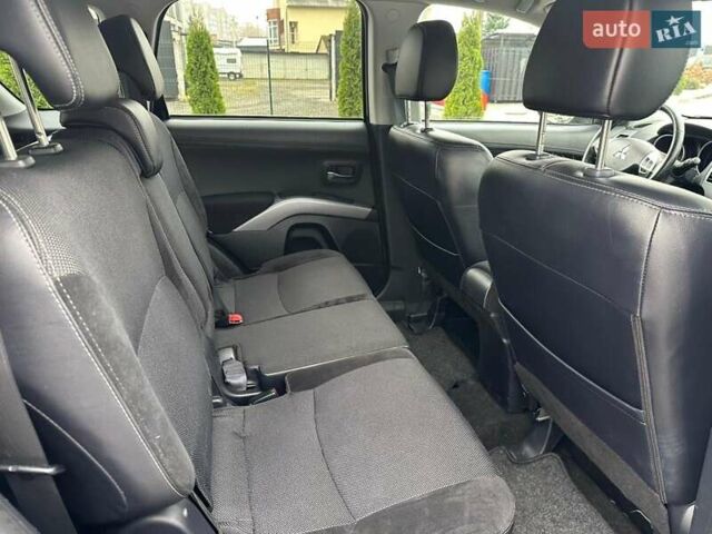 Черный Мицубиси Аутлендер, объемом двигателя 2.2 л и пробегом 226 тыс. км за 10750 $, фото 11 на Automoto.ua