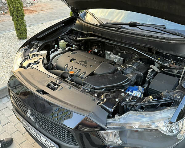 Міцубісі Аутлендер 2011 у Львові на Automoto.ua Чорний Міцубісі Аутлендер, об'ємом двигуна 2.36 л та пробігом 172 тис. км за 11000 $, фото 8 на Automoto.ua