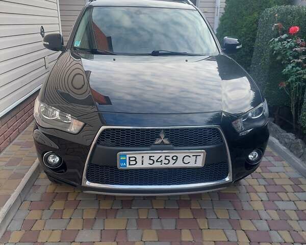 Чорний Міцубісі Аутлендер, об'ємом двигуна 2.3 л та пробігом 271 тис. км за 10500 $, фото 1 на Automoto.ua