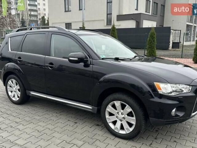 Черный Мицубиси Аутлендер, объемом двигателя 2.2 л и пробегом 226 тыс. км за 10750 $, фото 28 на Automoto.ua