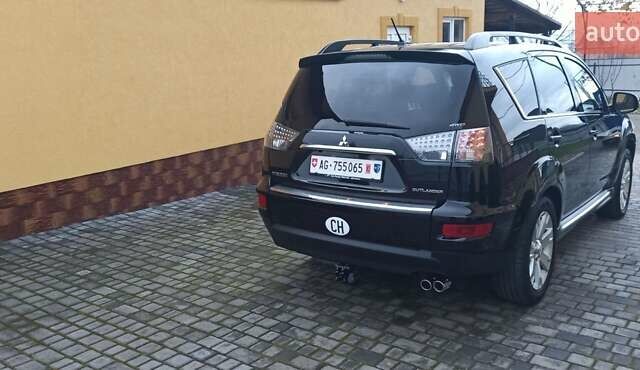 Черный Мицубиси Аутлендер, объемом двигателя 2.2 л и пробегом 209 тыс. км за 12700 $, фото 8 на Automoto.ua