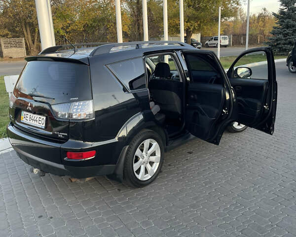 Чорний Міцубісі Аутлендер, об'ємом двигуна 2.4 л та пробігом 93 тис. км за 12500 $, фото 24 на Automoto.ua