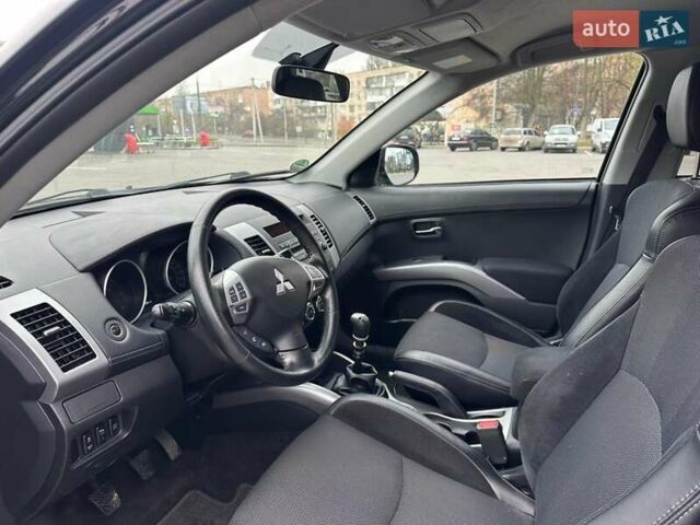 Черный Мицубиси Аутлендер, объемом двигателя 2.2 л и пробегом 226 тыс. км за 10750 $, фото 34 на Automoto.ua