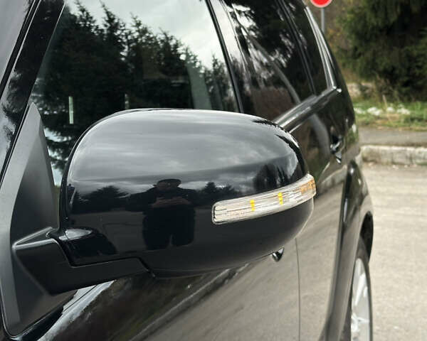 Чорний Міцубісі Аутлендер, об'ємом двигуна 2.2 л та пробігом 236 тис. км за 11399 $, фото 27 на Automoto.ua