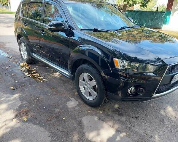 Чорний Міцубісі Аутлендер, об'ємом двигуна 2.3 л та пробігом 271 тис. км за 10500 $, фото 6 на Automoto.ua