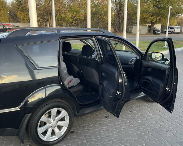 Чорний Міцубісі Аутлендер, об'ємом двигуна 2.4 л та пробігом 93 тис. км за 12500 $, фото 23 на Automoto.ua