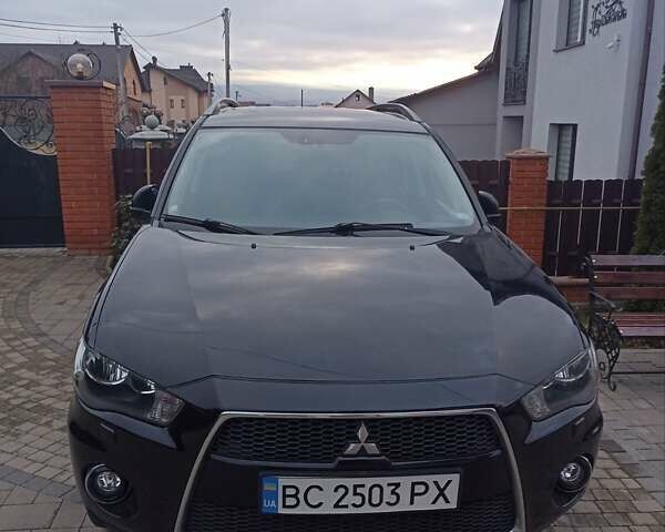 Черный Мицубиси Аутлендер, объемом двигателя 2 л и пробегом 196 тыс. км за 9900 $, фото 6 на Automoto.ua