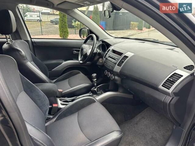 Черный Мицубиси Аутлендер, объемом двигателя 2.2 л и пробегом 226 тыс. км за 10750 $, фото 10 на Automoto.ua