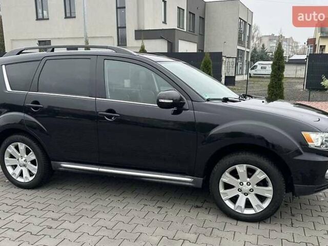 Черный Мицубиси Аутлендер, объемом двигателя 2.2 л и пробегом 226 тыс. км за 10750 $, фото 27 на Automoto.ua
