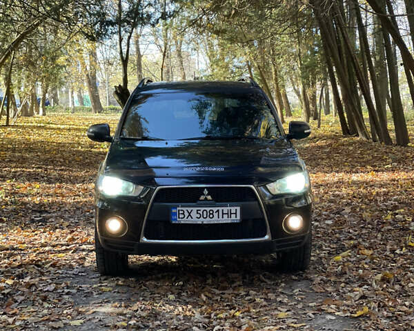 Міцубісі Аутлендер 2011 у Хмельницькому на Automoto.ua Чорний Міцубісі Аутлендер, об'ємом двигуна 2 л та пробігом 196 тис. км за 9500 $, фото 34 на Automoto.ua