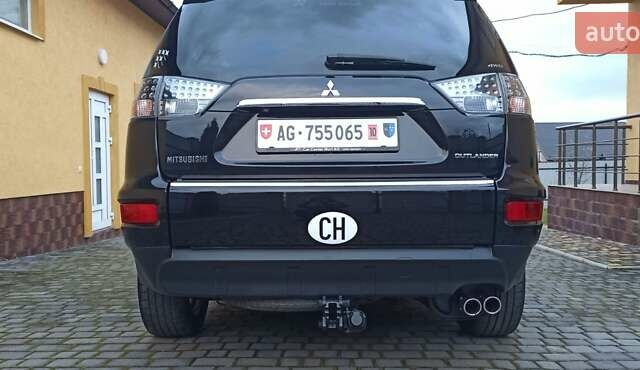 Черный Мицубиси Аутлендер, объемом двигателя 2.2 л и пробегом 209 тыс. км за 12700 $, фото 48 на Automoto.ua