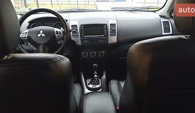 Черный Мицубиси Аутлендер, объемом двигателя 2.2 л и пробегом 209 тыс. км за 12700 $, фото 28 на Automoto.ua