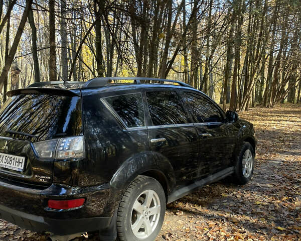 Міцубісі Аутлендер 2011 у Хмельницькому на Automoto.ua Чорний Міцубісі Аутлендер, об'ємом двигуна 2 л та пробігом 196 тис. км за 9500 $, фото 30 на Automoto.ua