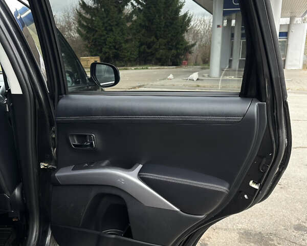 Чорний Міцубісі Аутлендер, об'ємом двигуна 2.2 л та пробігом 236 тис. км за 11399 $, фото 61 на Automoto.ua