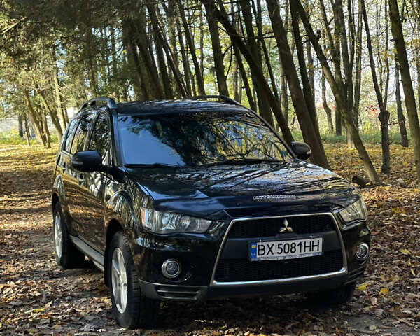 Міцубісі Аутлендер 2011 у Хмельницькому на Automoto.ua Чорний Міцубісі Аутлендер, об'ємом двигуна 2 л та пробігом 196 тис. км за 9500 $, фото 1 на Automoto.ua
