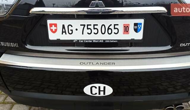 Черный Мицубиси Аутлендер, объемом двигателя 2.2 л и пробегом 209 тыс. км за 12700 $, фото 38 на Automoto.ua