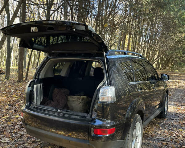 Міцубісі Аутлендер 2011 у Хмельницькому на Automoto.ua Чорний Міцубісі Аутлендер, об'ємом двигуна 2 л та пробігом 196 тис. км за 9500 $, фото 21 на Automoto.ua