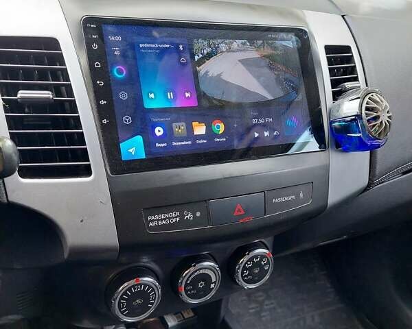 Чорний Міцубісі Аутлендер, об'ємом двигуна 2.3 л та пробігом 271 тис. км за 10500 $, фото 5 на Automoto.ua