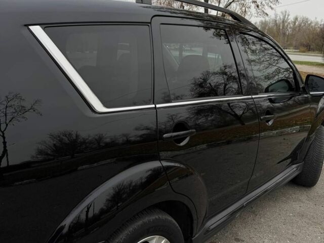 Черный Мицубиси Аутлендер, объемом двигателя 2.2 л и пробегом 253 тыс. км за 12500 $, фото 2 на Automoto.ua