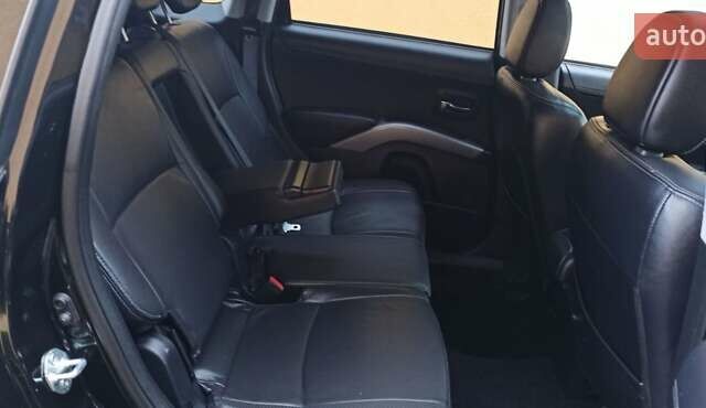 Черный Мицубиси Аутлендер, объемом двигателя 2.2 л и пробегом 209 тыс. км за 12700 $, фото 41 на Automoto.ua