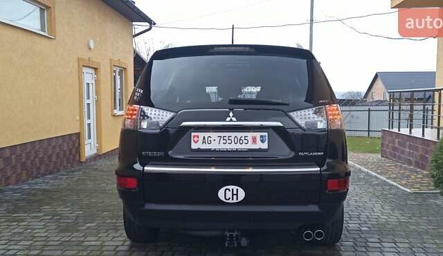 Черный Мицубиси Аутлендер, объемом двигателя 2.2 л и пробегом 209 тыс. км за 12700 $, фото 10 на Automoto.ua