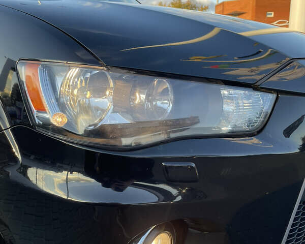 Чорний Міцубісі Аутлендер, об'ємом двигуна 2.4 л та пробігом 93 тис. км за 12500 $, фото 7 на Automoto.ua